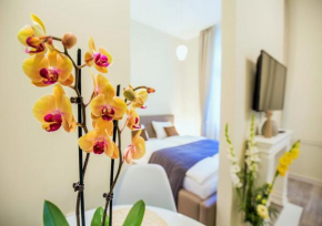 Гостиница Eden Center Home  Дьор